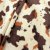 Fourrure imitation Vache Velboa Marron-Beige - 150 cm